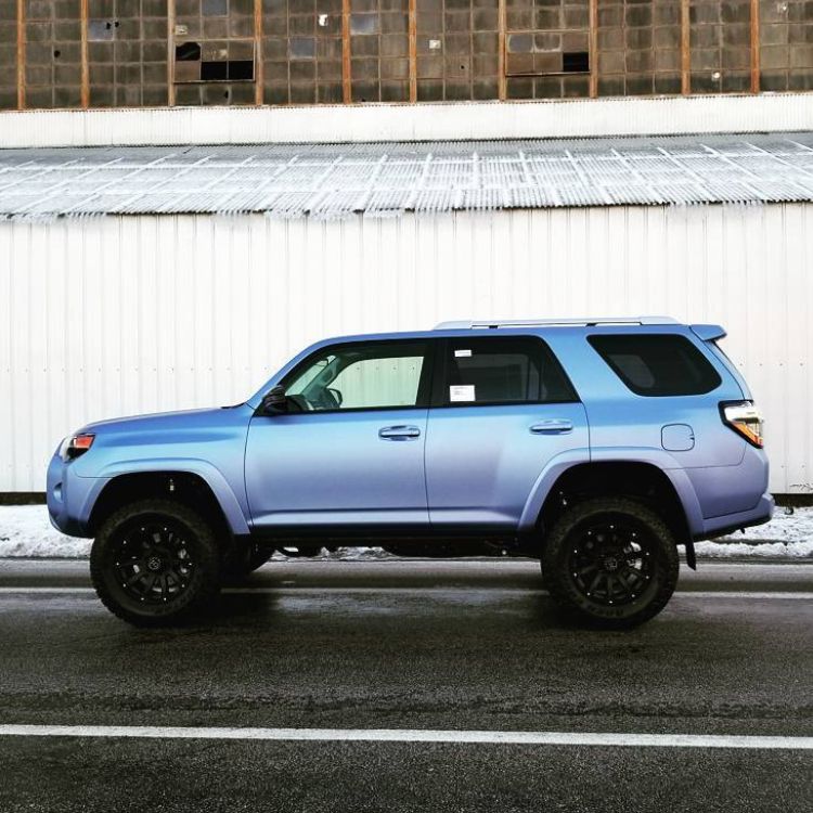 Blue Toyota 4Runner with tinted windows